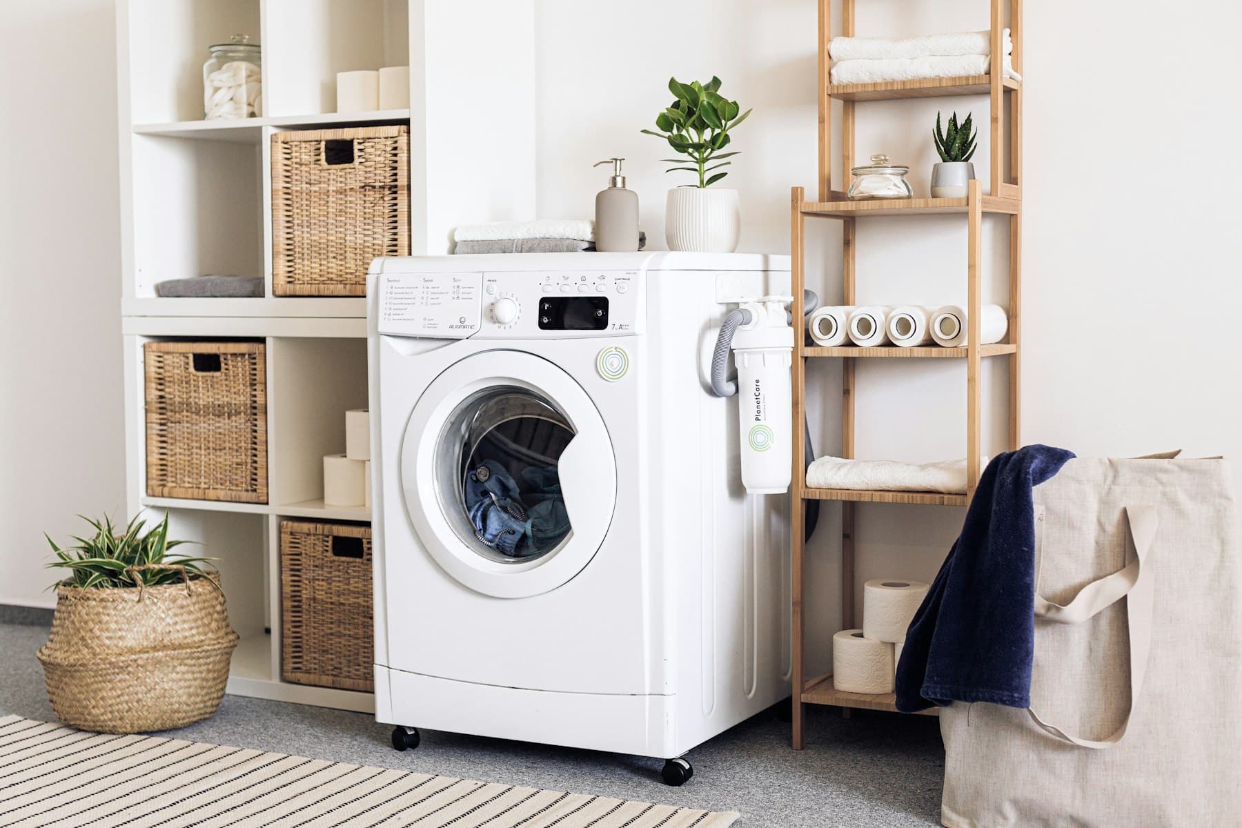 Front-loading washing machine in a laundry room ready for appliance removal