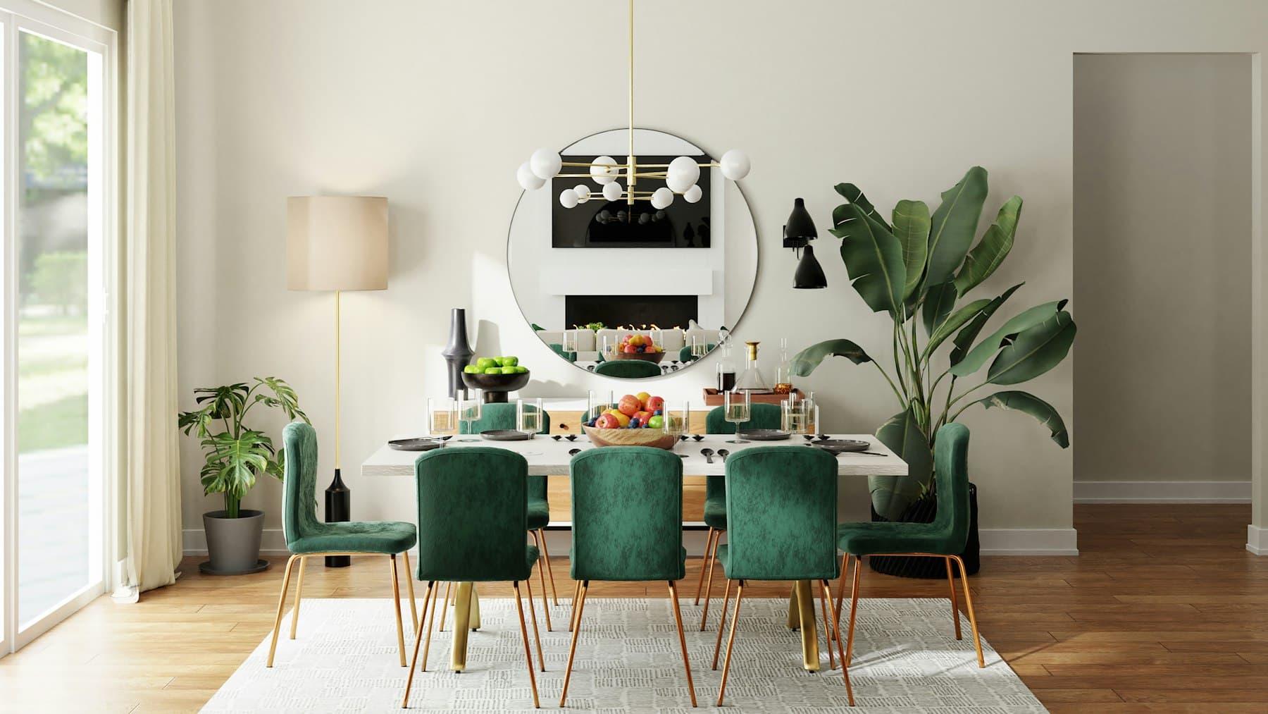 Round dining table with green velvet chairs in a bright Dubai home
