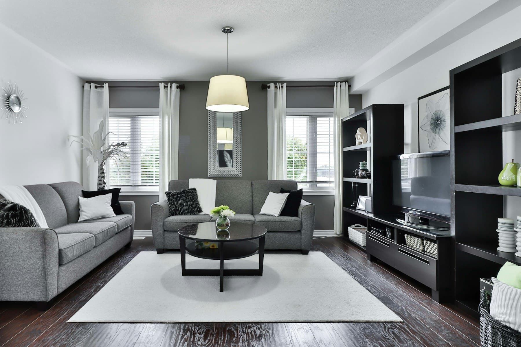 Modern Dubai living room with grey sofas ready for furniture removal
